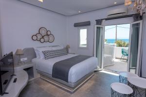 Voodi või voodid majutusasutuse Aegean Gold toas