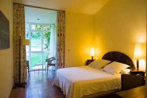 Cama o camas de una habitación en La Posada