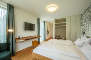 Postel nebo postele na pokoji v ubytování Seehörnle Bio Hotel & Gasthaus