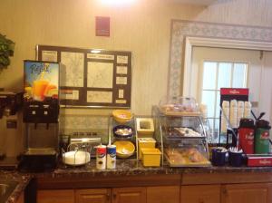 a kitchen counter top with food on top of it at Americas Best Value Inn Blue Ridge in Blue Ridge