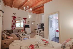 a living room with a couch and a table at Villa Matilda in Borsh