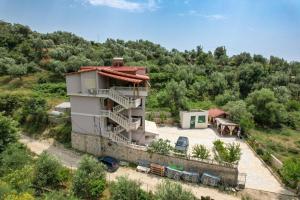an aerial view of a building on a hill at Villa Matilda in Borsh