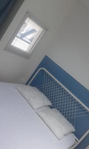 Llit o llits en una habitació de T2 duplex CARCANS Maubuisson vue pins situé au 129 avenue Maubuisson