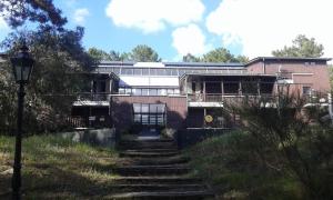 Jardí fora de T2 duplex CARCANS Maubuisson vue pins situé au 129 avenue Maubuisson
