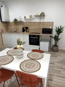 Kjøkken eller kjøkkenkrok på Appartement avec Spa et Sauna