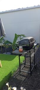 a table with a toaster on top of it at Asociación deportiva TAGOROR LOS OLIVITOS in Adeje