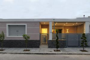 a house with a gate in front of it at Keti's home in Athens