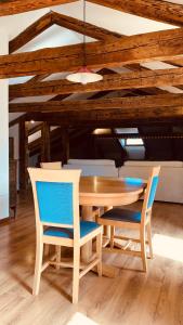 a dining room with a wooden table and chairs at Cà Sardi in Venice