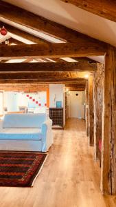 a bedroom with two beds in a room with wooden ceilings at Cà Sardi in Venice