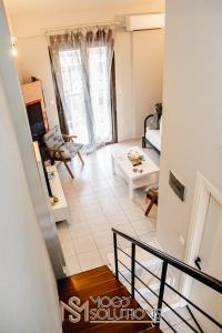 a view of the living room from the second floor at Dryades Pefkochori MoodSolutions Living in Pefkohori