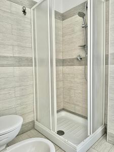 a shower stall in a bathroom with a toilet at Tropea Solemare in Tropea