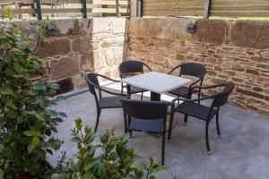 A patio or other outdoor area at Nova Compostela Apartments