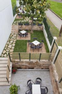 A garden outside Nova Compostela Apartments