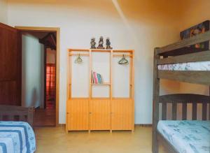 Katil atau katil-katil dalam bilik di Casa Nômade