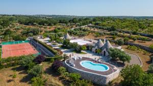The swimming pool at or close to Trulli Ericla Luxury