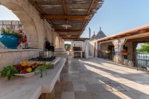 Kép Trulli Ericla Luxury szállásáról Castellana Grottéban a galériában