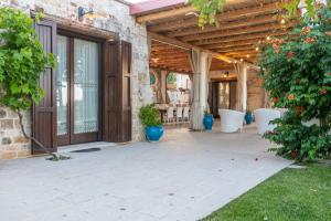 A garden outside Trulli Ericla Luxury