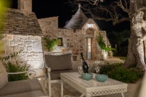 A seating area at Trulli Ericla Luxury