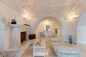 A seating area at Trulli Ericla Luxury
