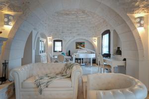 A seating area at Trulli Ericla Luxury