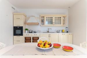 A kitchen or kitchenette at Trulli Ericla Luxury