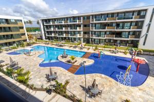 Hồ bơi trong/gần Estúdio Aconchegante Com Vista para Piscina