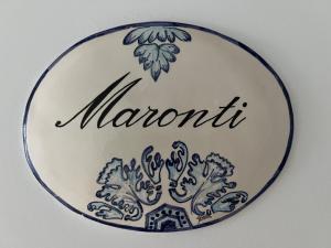 Um certificado, prêmio, placa ou outro documento exibido em TEA Luxury - Praia a Mare