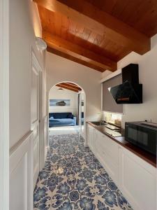 A cozinha ou cozinha compacta de TEA Luxury - Praia a Mare