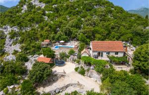 an aerial view of a house on a mountain at Lovely Home In Ploce With Sauna in Ploče