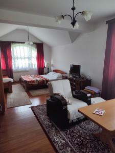Letto o letti in una camera di Pansion Kamin