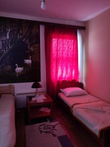Letto o letti in una camera di Pansion Kamin