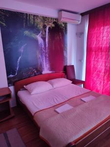Letto o letti in una camera di Pansion Kamin