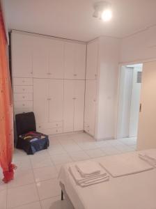 Postel nebo postele na pokoji v ubytování Pireas view