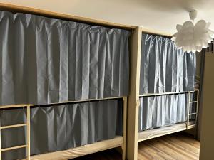 Voodi või voodid majutusasutuse Bohobos Hostel toas