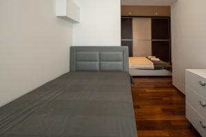 Posteľ alebo postele v izbe v ubytovaní Lumaja luxury apartman