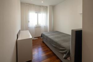Posteľ alebo postele v izbe v ubytovaní Lumaja luxury apartman