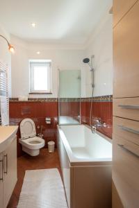 Kúpeľňa v ubytovaní Lumaja luxury apartman