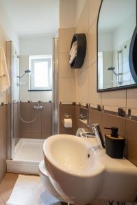 Kúpeľňa v ubytovaní Lumaja luxury apartman