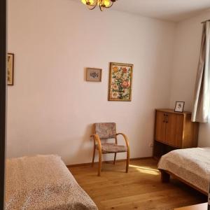 Postel nebo postele na pokoji v ubytování Villa Musik - apartments in historical Villa , Baden