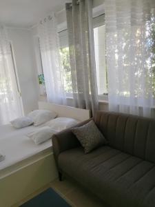 Postel nebo postele na pokoji v ubytování STUDIO APARTMAN villa JURAS