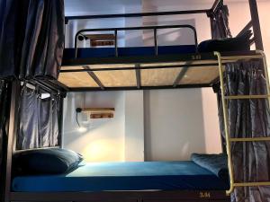 Postel nebo postele na pokoji v ubytování JOY HOSTEL