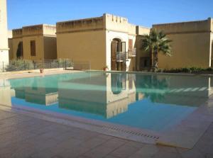 Bazén v ubytování Fort Chambray Gozo nebo v jeho okolí