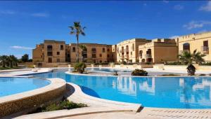 Bazén v ubytování Fort Chambray Gozo nebo v jeho okolí