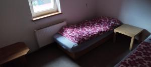 Ein Bett oder Betten in einem Zimmer der Unterkunft U Anny