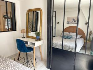 Posteľ alebo postele v izbe v ubytovaní Magnifique logement au pied du Château