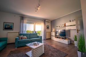 Et opholdsområde på Apartman Nino