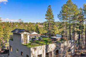 an aerial view of a house with a yard at 360 Rooftop Views, New Build, Hottub, Mtn Luxury in Flagstaff