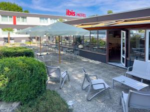 Veitingastaður eða matsölustaður á ibis 3 Lacs Neuchâtel