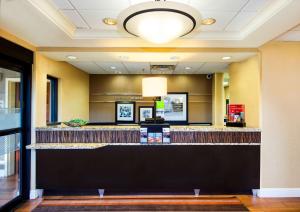 a lobby of a fast food restaurant with a counter at Hampton Inn & Suites-Atlanta Airport North-I-85 in Atlanta
