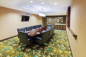 a conference room with a long table and chairs at Hampton Inn Austin Oak Hill in Austin